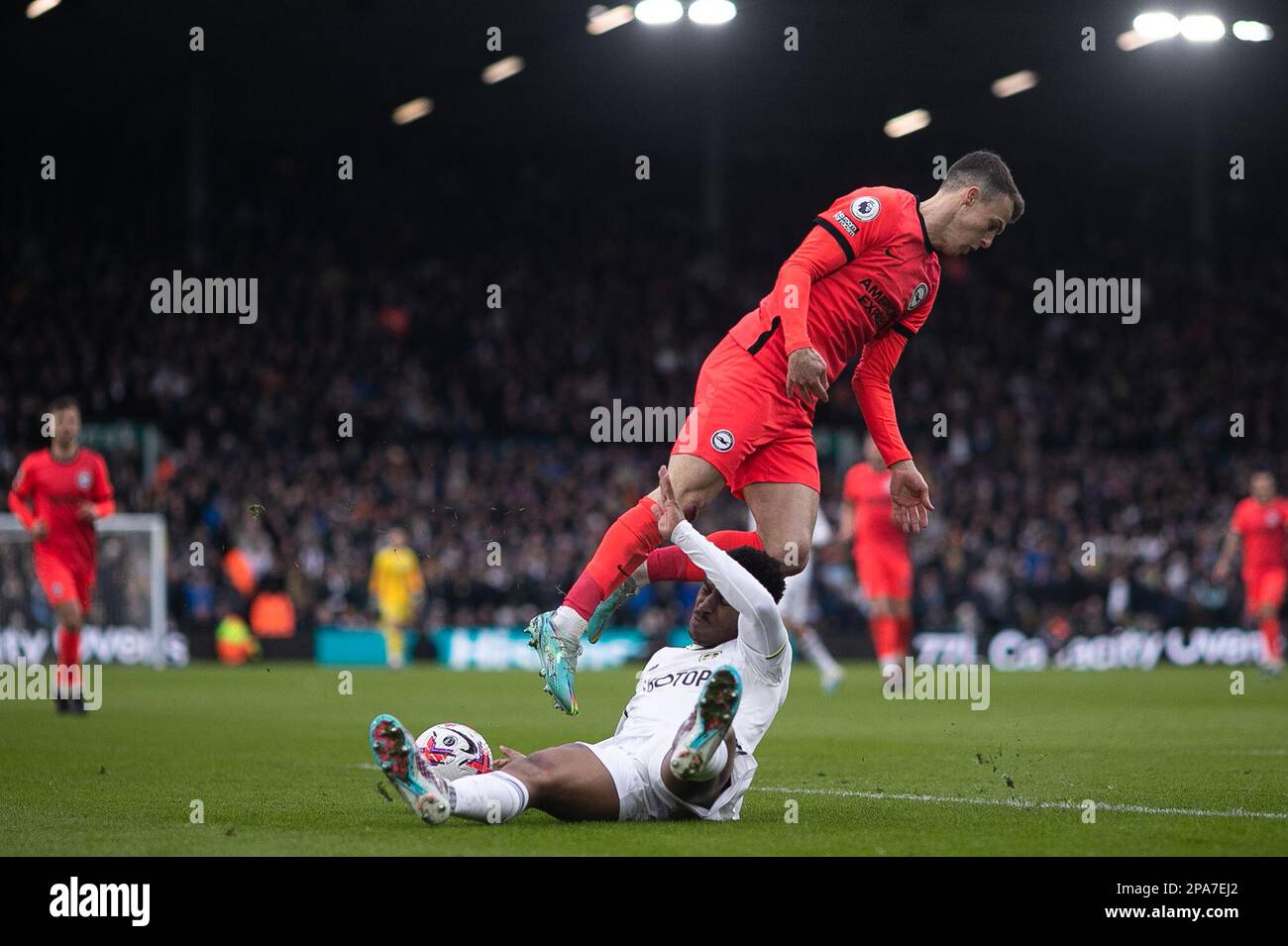 Junior Firpo of Leeds United battles with Solly March of Brighton & Hove Albion during the Premier League match between Leeds United and Brighton & Hove Albion at Elland Road, Leeds on Sunday 12th March 2023. (Photo: Pat Scaasi | MI News) Credit: MI News & Sport /Alamy Live News Stock Photo