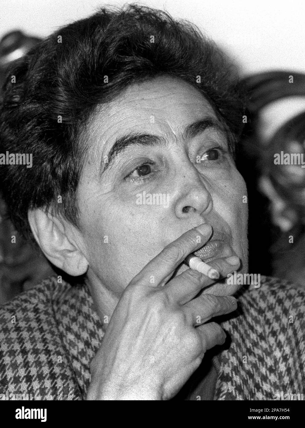 smoke a cigarette that's 9 miles long File ** In this Nov. 18 1991 file photo, Monica Lovinescu, a Romanian  journalist who was an outspoken opponent of Romania's former communist  regime, attends a meeting in Bucharest Romania. Lovinescu