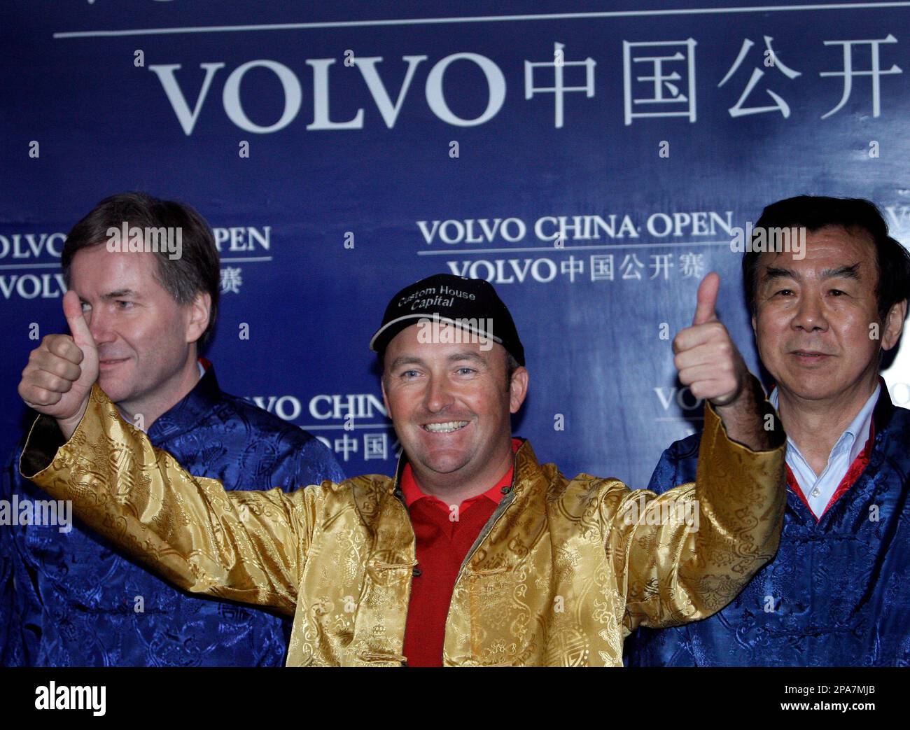 Ireland's Damien McGrane wearing the gold dress show thumbup after he