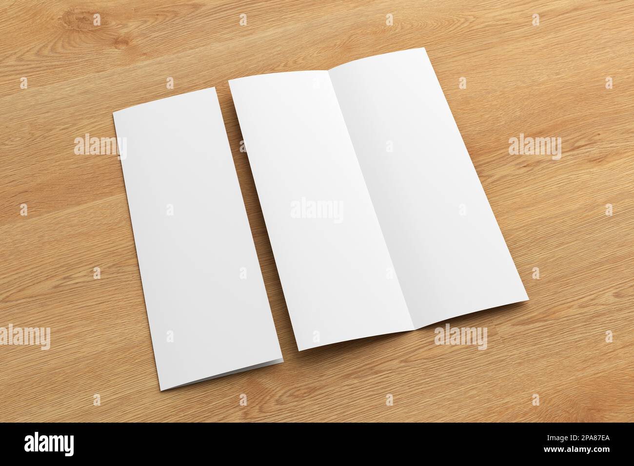 Half-folded flyer A4 vertical booklet mock up on wooden background. Side view Stock Photo