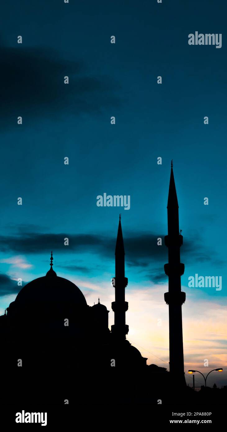 eminonu yeni cami or new mosque at sunset islamic concept vertical photo ramadan or kadir gecesi or laylat al qadr concept vertical story photo 2PA880P