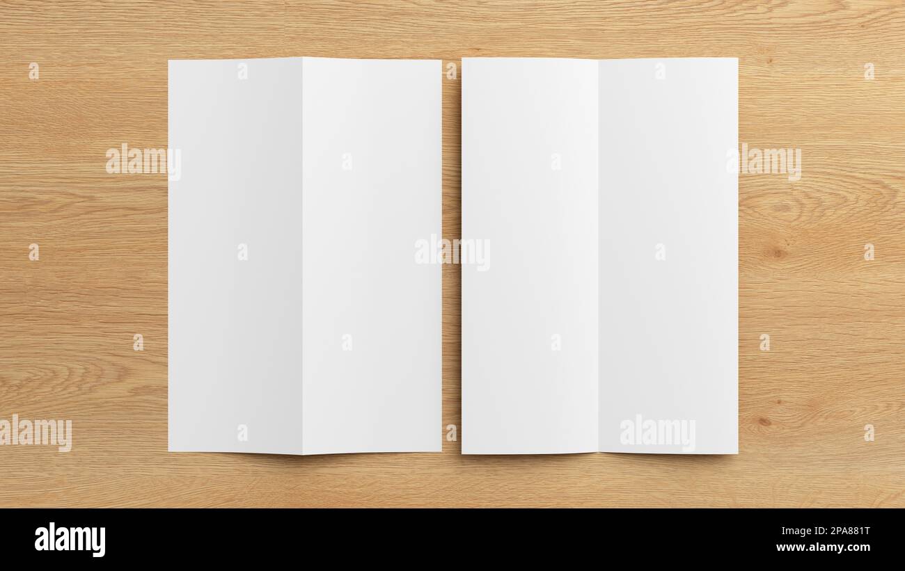 Half-folded flyer A4 vertical booklet mock up on wooden background. View directly above Stock Photo