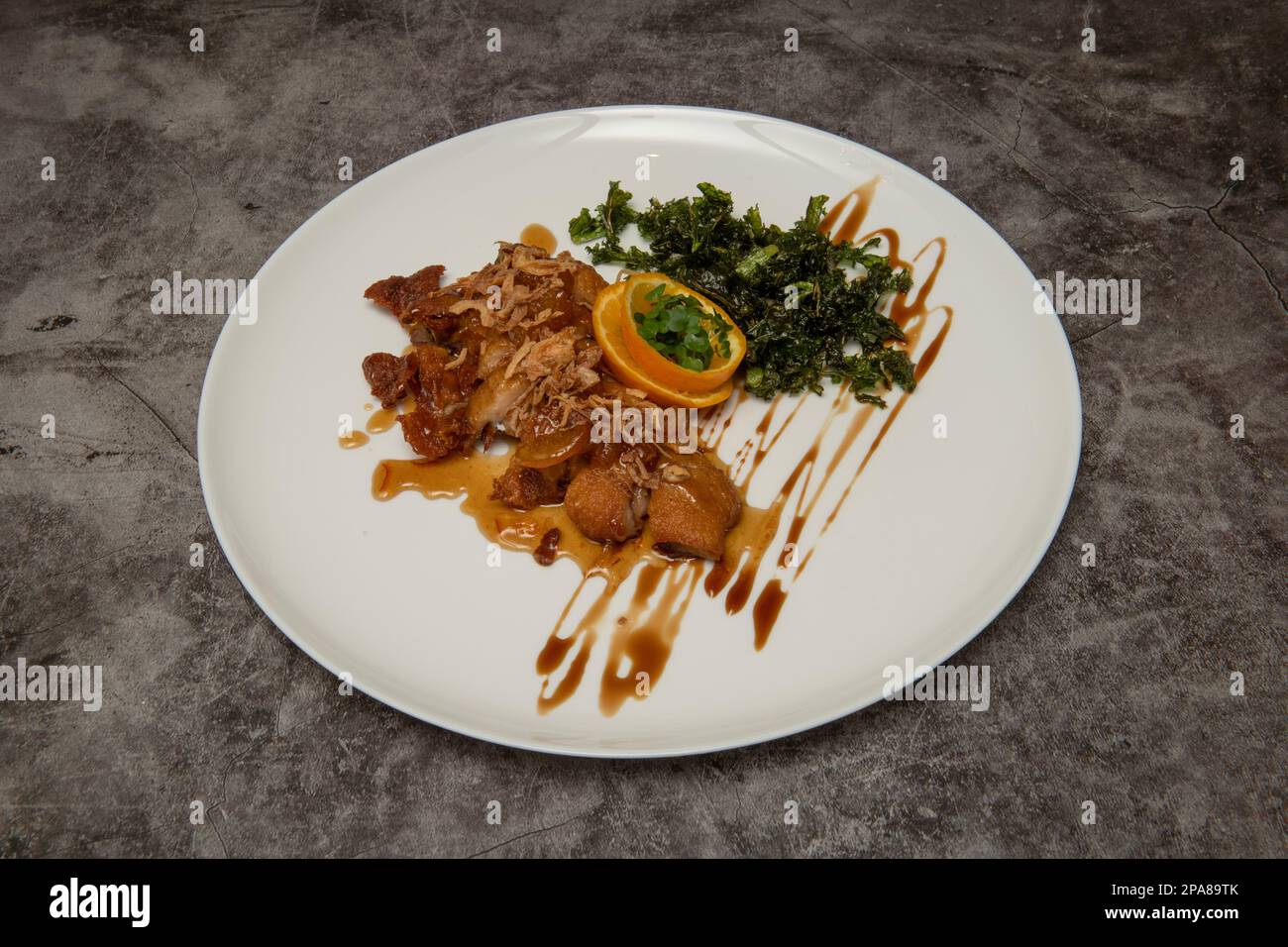 Duck with orange sauce Stock Photo - Alamy