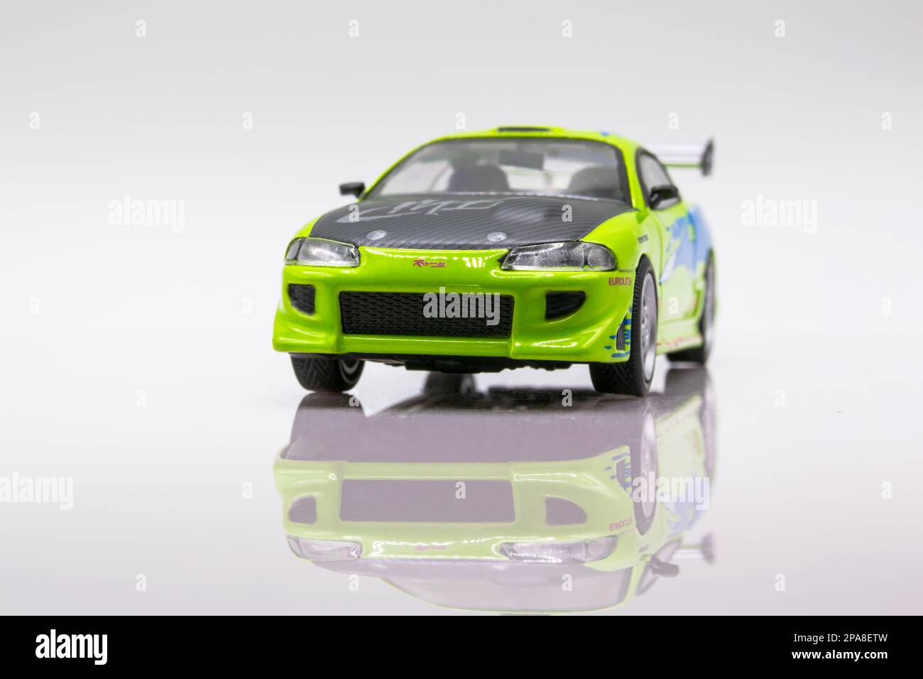 Fast&Furious Mitsubishi Eclipse 1:43 model car, front view, white background with reflection Stock Photo