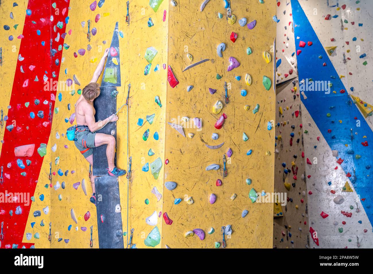climbing artificial climbing walls with belay rope Stock Photo Alamy