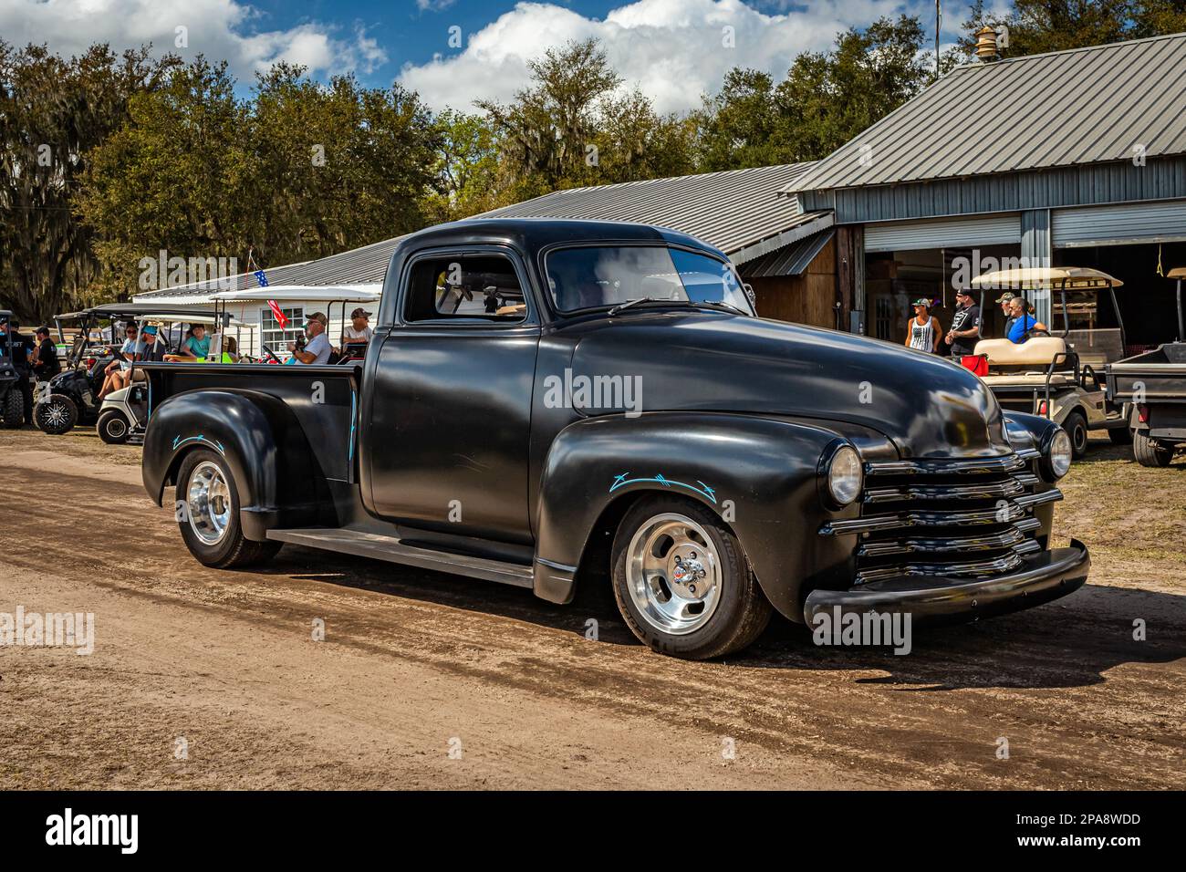 Fort Meade, FL - February 26, 2022: High perspective front corner view of a 1952 Chevrolet Advance Design 3100 Pickup truck at a local car show. Stock Photo
