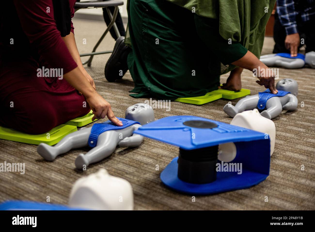 CPR training class by security guard in office Stock Photo Alamy