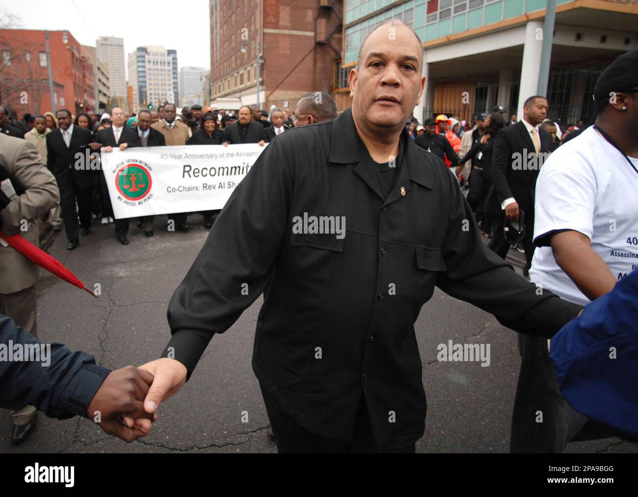 Rev Al Sharpton's lawyer, Michael A Hardy walks in front of Martin