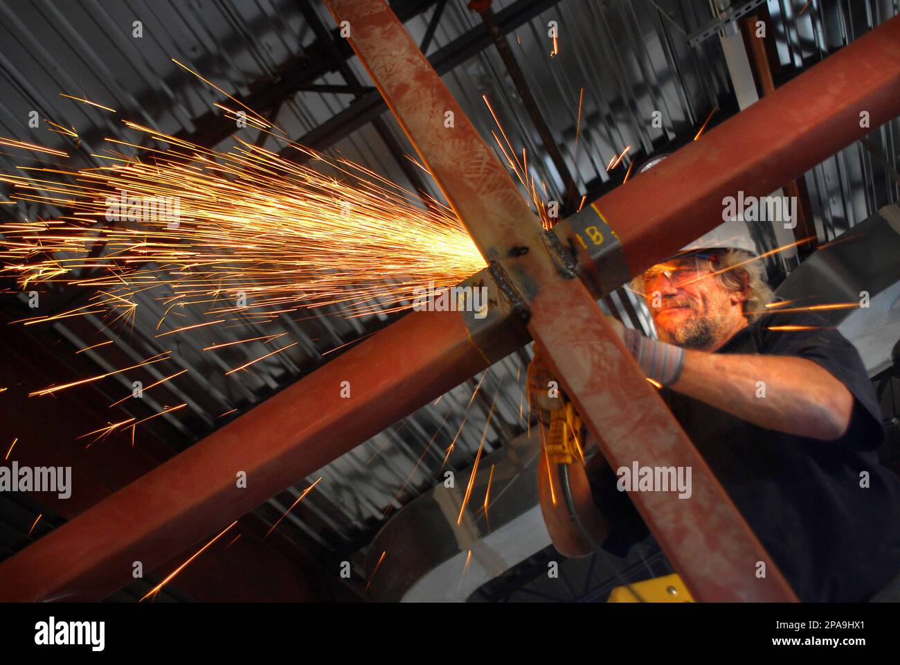 Gary Edmondson works on the steel structure in the Yuma County Library