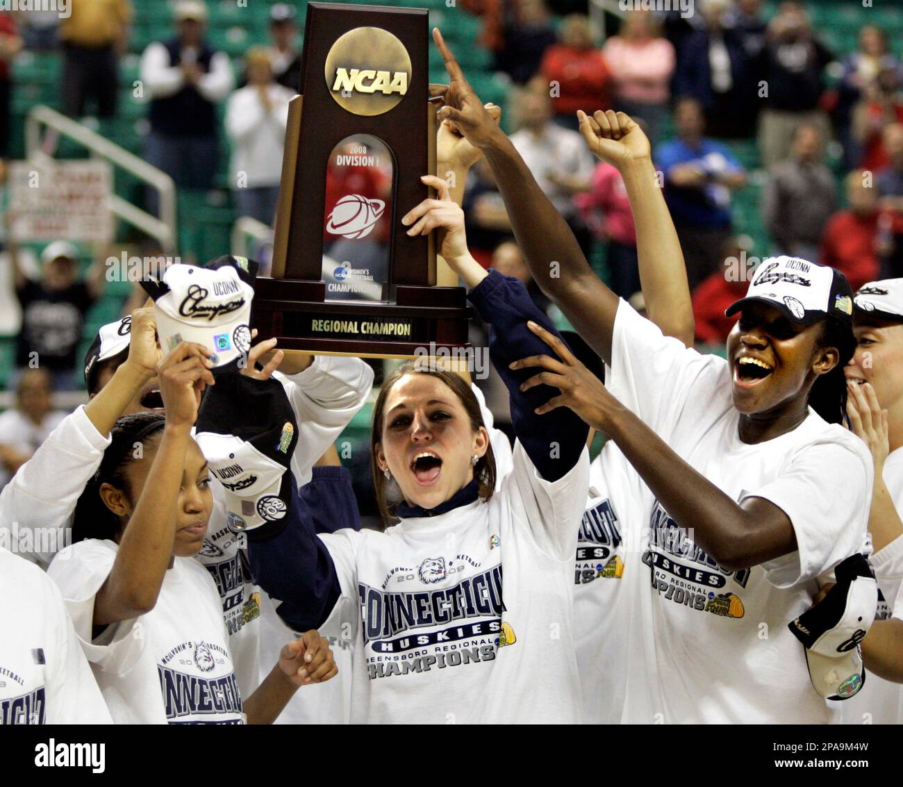 Connecticut guard Renee Montgomery, left, guard Mel Thomas and center