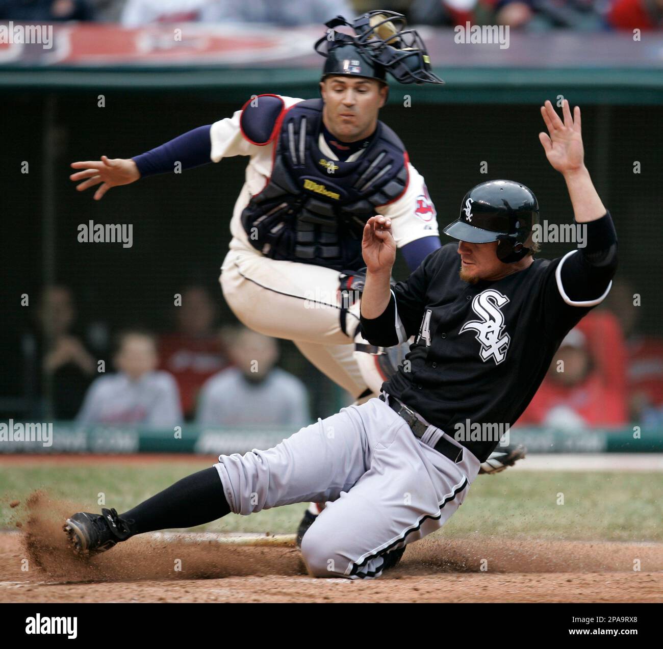 Chicago White Sox's Joe Crede, left, gets a cleat to the neck as Baltimore  Orioles' Miguel Tejada completes a double play that caught Crede and Ross  Gload out in the fifth inning