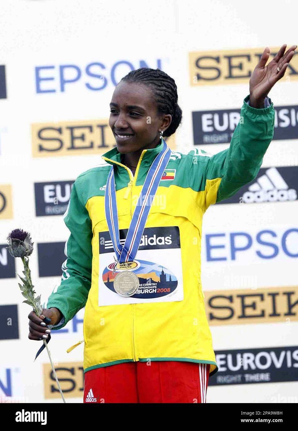 Tirunesh Dibaba of Ethiopia celebrate's with her medal after winning ...