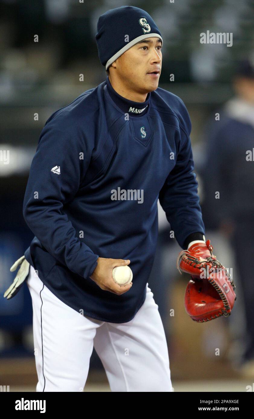 Seattle Mariners' catcher Kenji Johjima, of Japan, works out in
