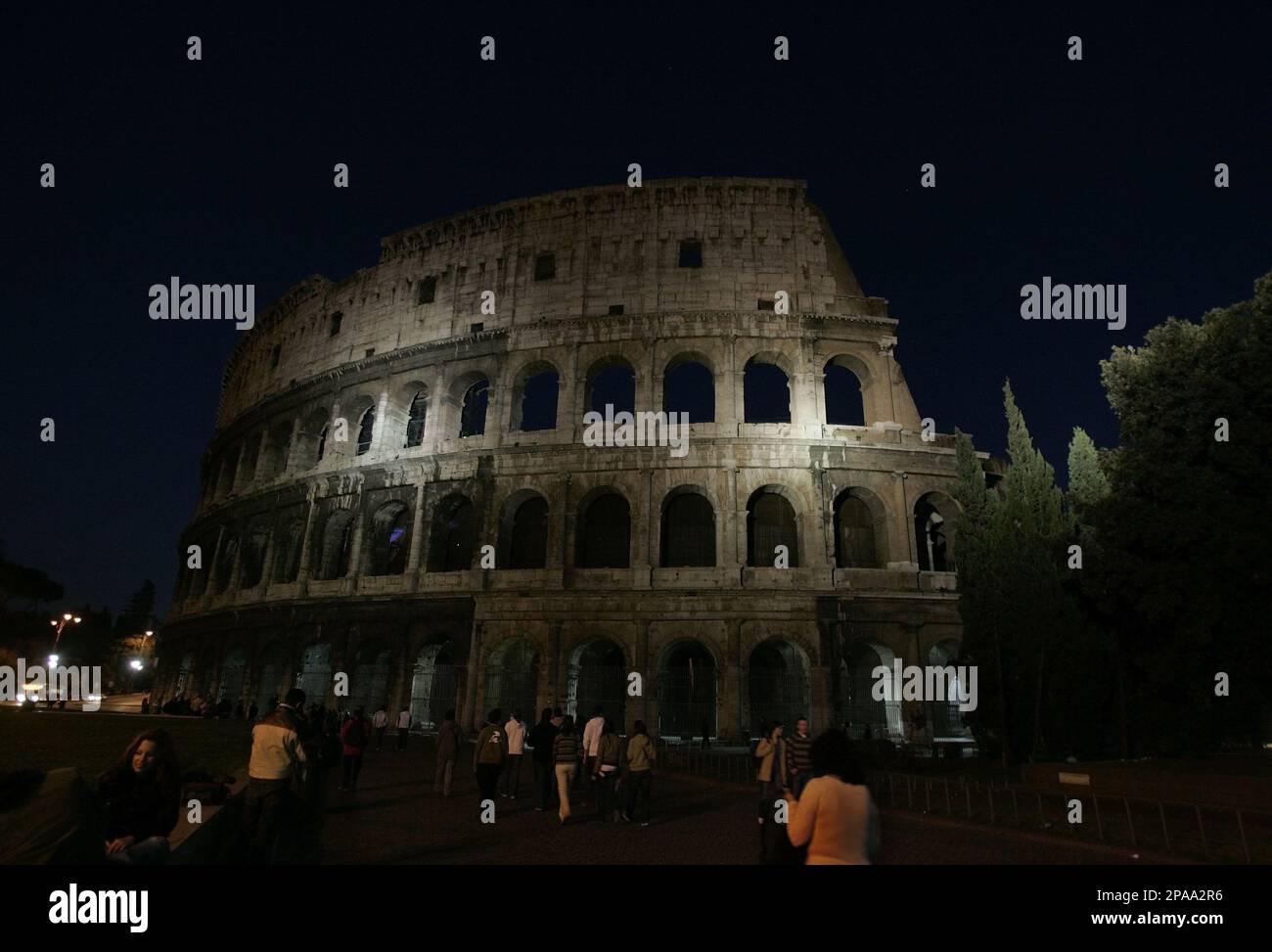 FILE ** A view of Rome's ancient Colosseum with its lights off, in this ...