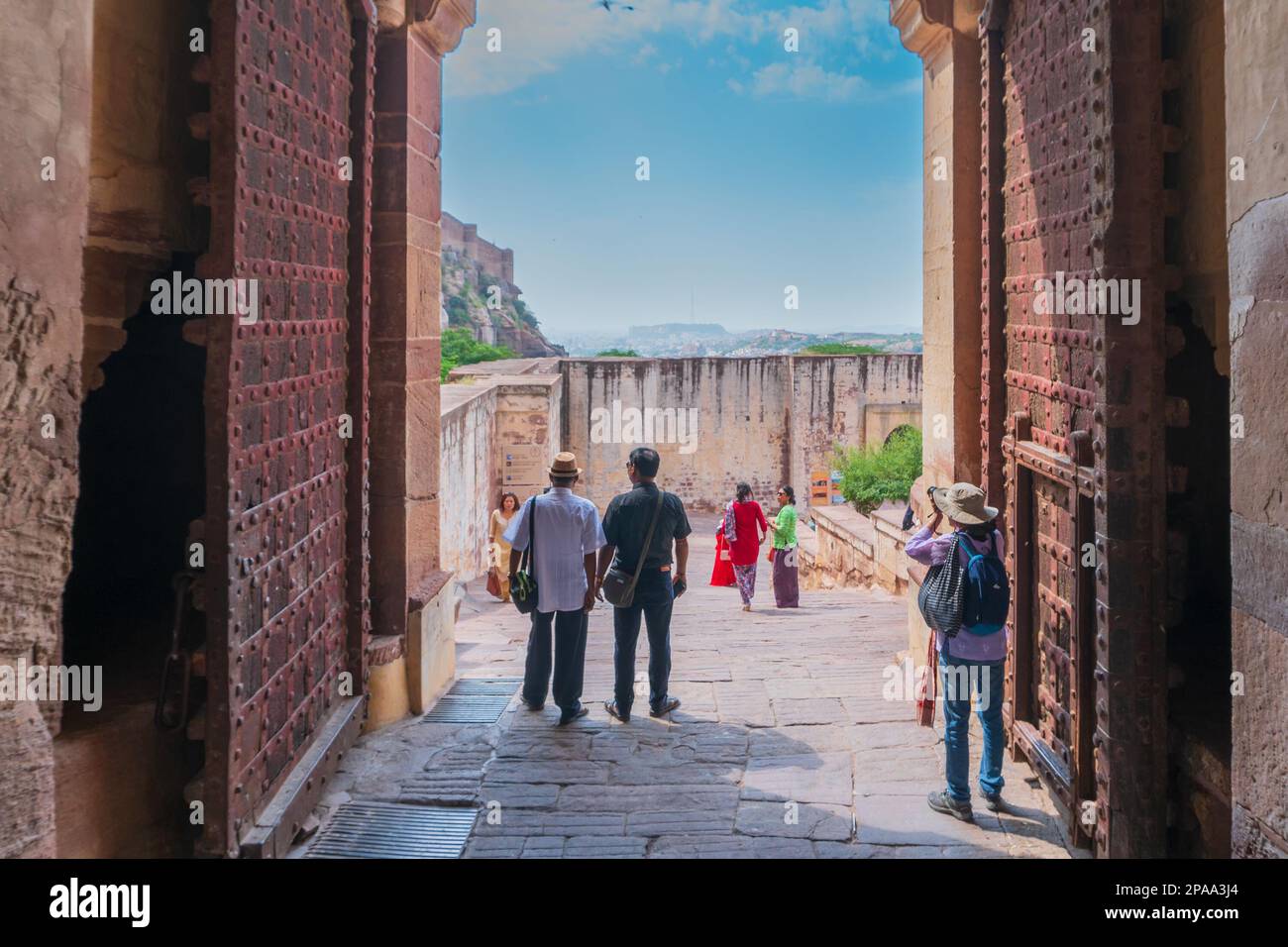 Jodhpur, Rajasthan, India - 19th October 2019 : Indian female photographer shooting at famous old Mehrangarh fort. Fort is UNESCO world heritage site Stock Photo