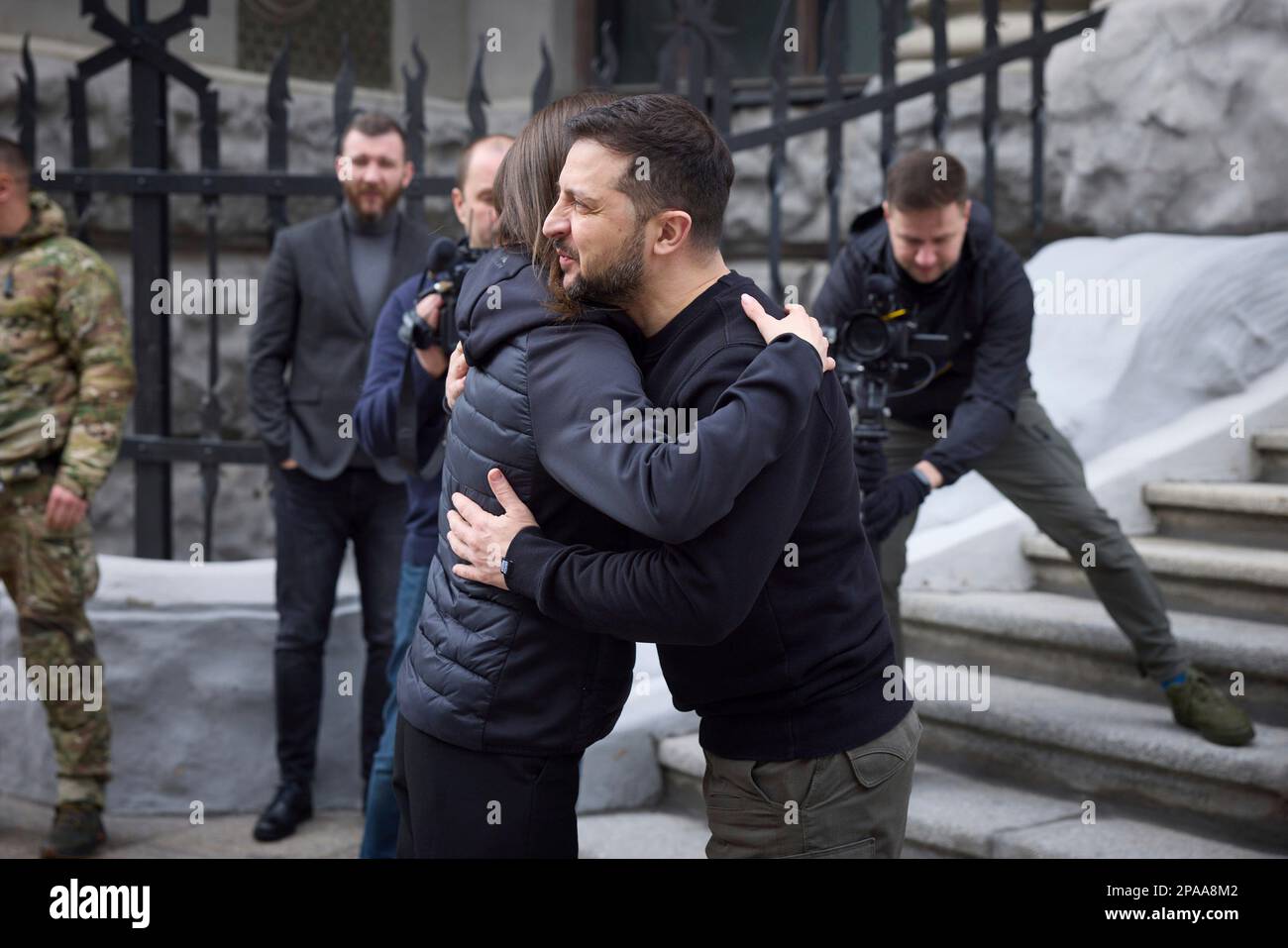 Kyiv, Ukraine. 10th Mar, 2023. Finnish Prime Minister Sanna Marin, left, embraces Ukrainian President Volodymyr Zelenskyy on her arrival at the Mariinsky Palace, March 10, 2023 in Kyiv, Ukraine. Credit: Pool Photo/Ukrainian Presidential Press Office/Alamy Live News Stock Photo