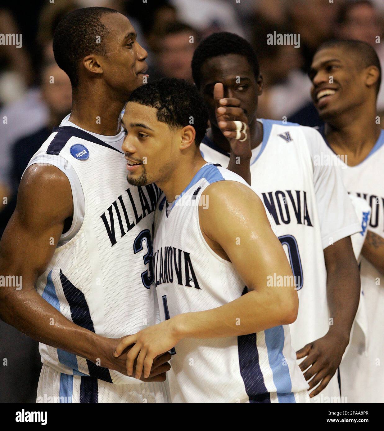 ** FILE ** Villanova's Scottie Reynolds (1) celebrates with teammates ...