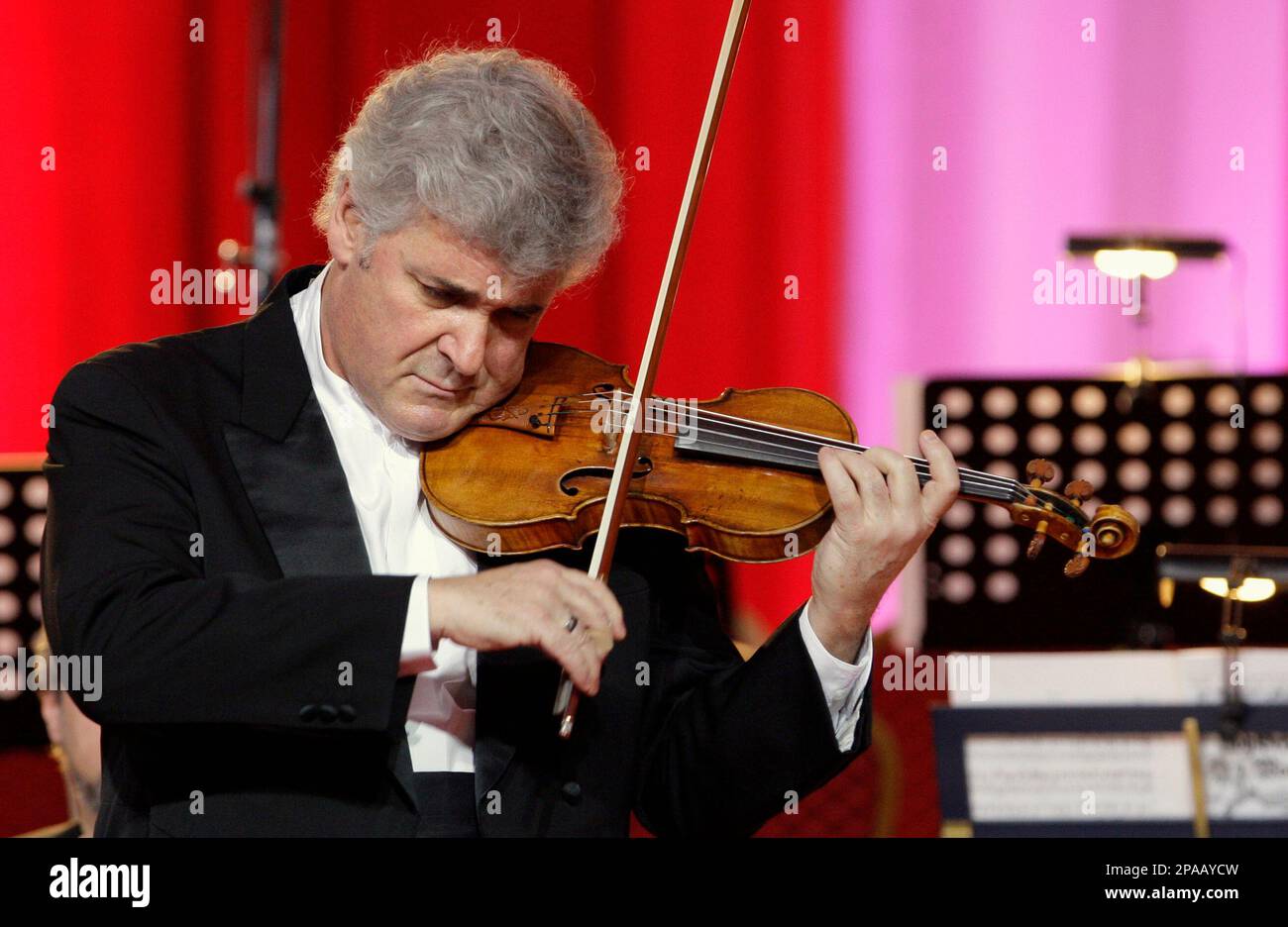 Violinist Pinchas Zuckerman plays a 250 year-old Guarnerius del Gesu violin  during a concert in Pashkov House, Moscow, Friday, March 21, 2008. The  violin, one of the most expensive musical instruments in