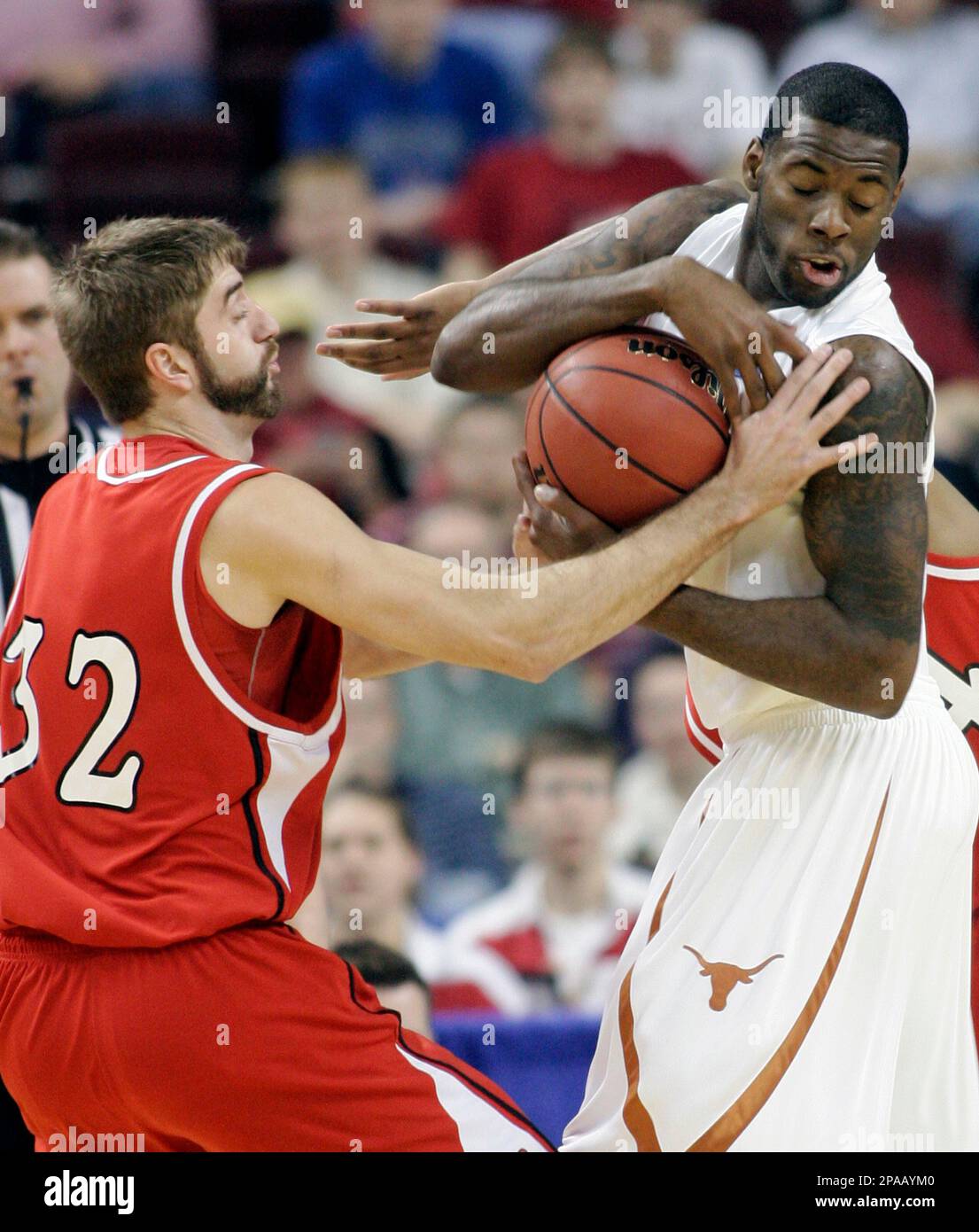 Texas guard Damion James 5 tries to protect the basketball from