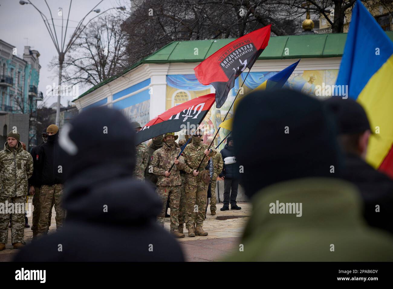 Kyiv, Ukraine. 10th Mar, 2023. Ukrainian soldiers pay their respects to ...