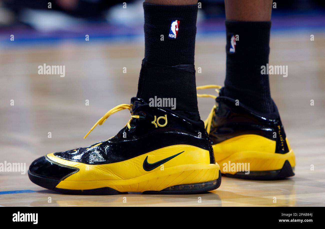Seattle SuperSonics forward Kevin Durant wears Nike basketball shoes while  facing the Denver Nuggets in the third quarter an NBA basketball game in  Denver on Sunday, March 16, 2008. Nike Inc. is