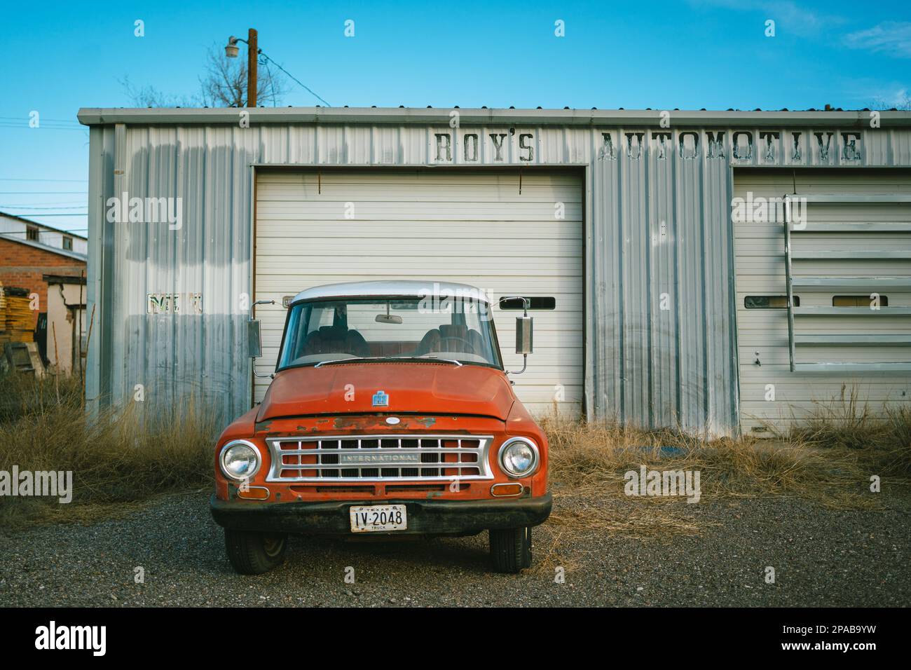 Red truck and automotive repair shop, Marfa, Texas Stock Photo