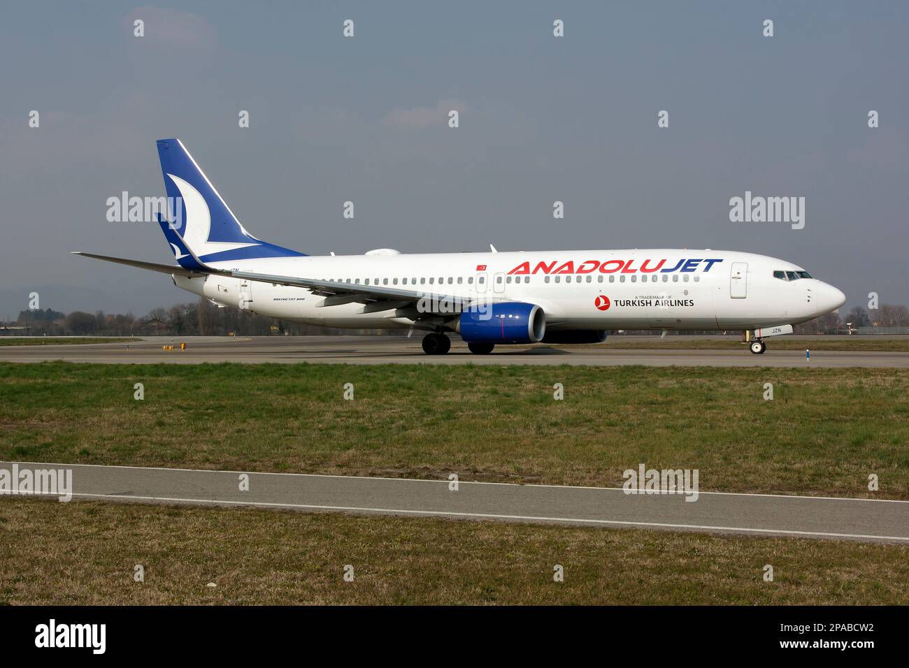 Bergamo, Italy. 4th Mar, 2023. An AnadoluJet Boeing 737-800 taxiing at Milan Bergamo Orio al Serio airport. AnadoluJet is a brand of Turkish Airlines operating as a regional airline. It operates domestic flights as well as flights to Northern Cyprus, Western Europe and Western Asia for its parent company. (Credit Image: © Fabrizio Gandolfo/SOPA Images via ZUMA Press Wire) EDITORIAL USAGE ONLY! Not for Commercial USAGE! Stock Photo