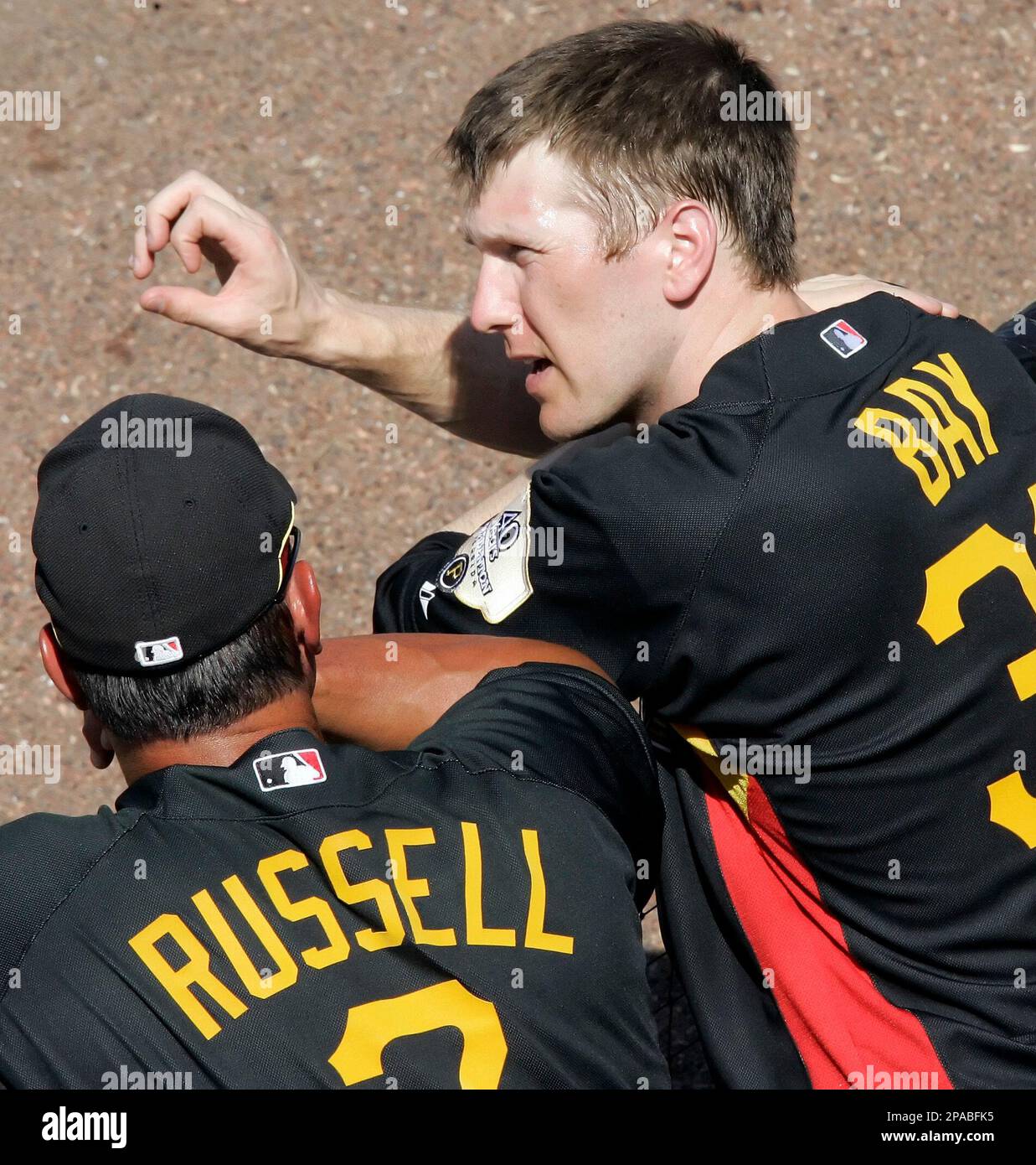 Pittsburgh Pirates' Jason Bay, right, talks with manager John