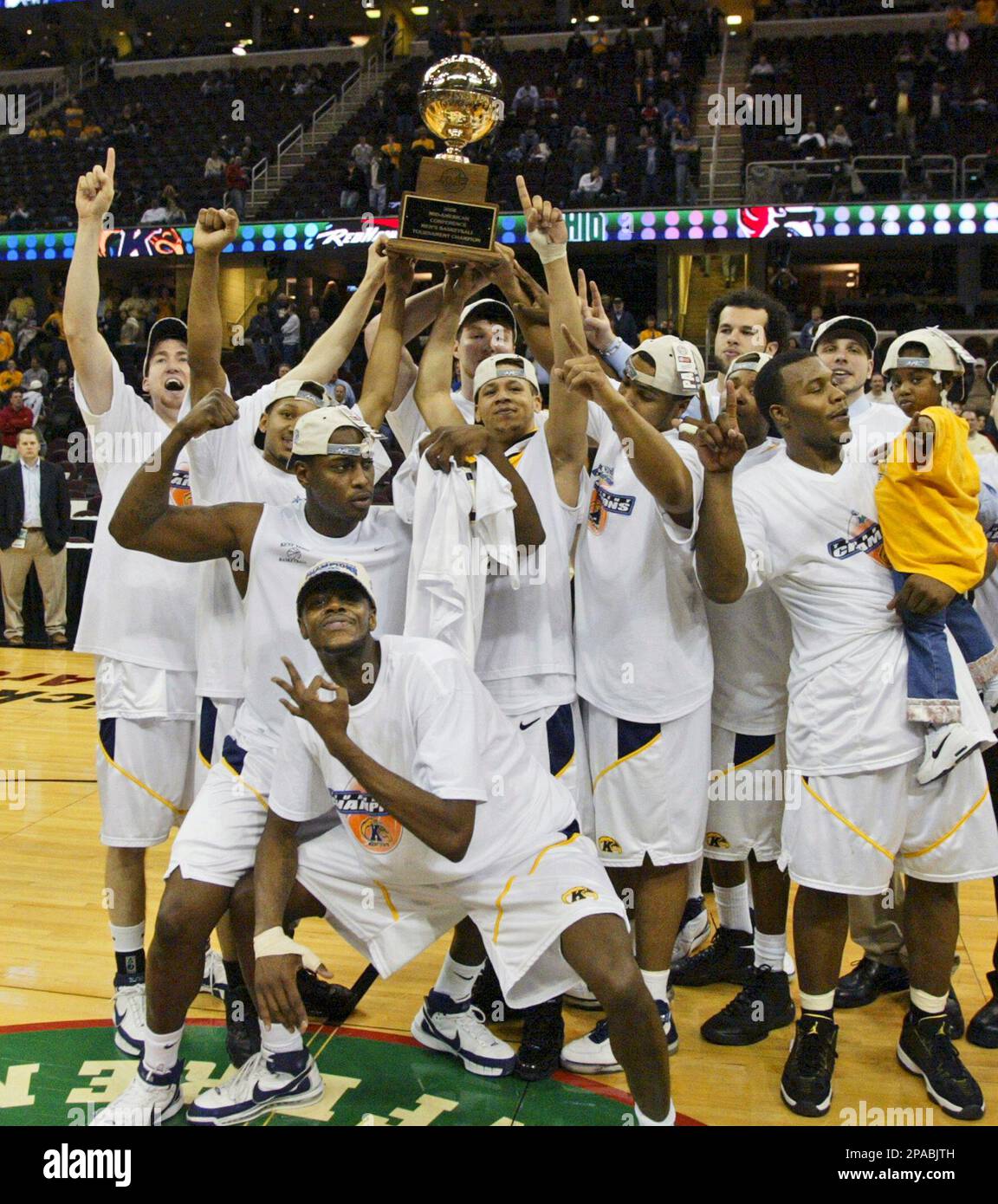 Kent State players hoist the trophy after beating Akron 7455 in the