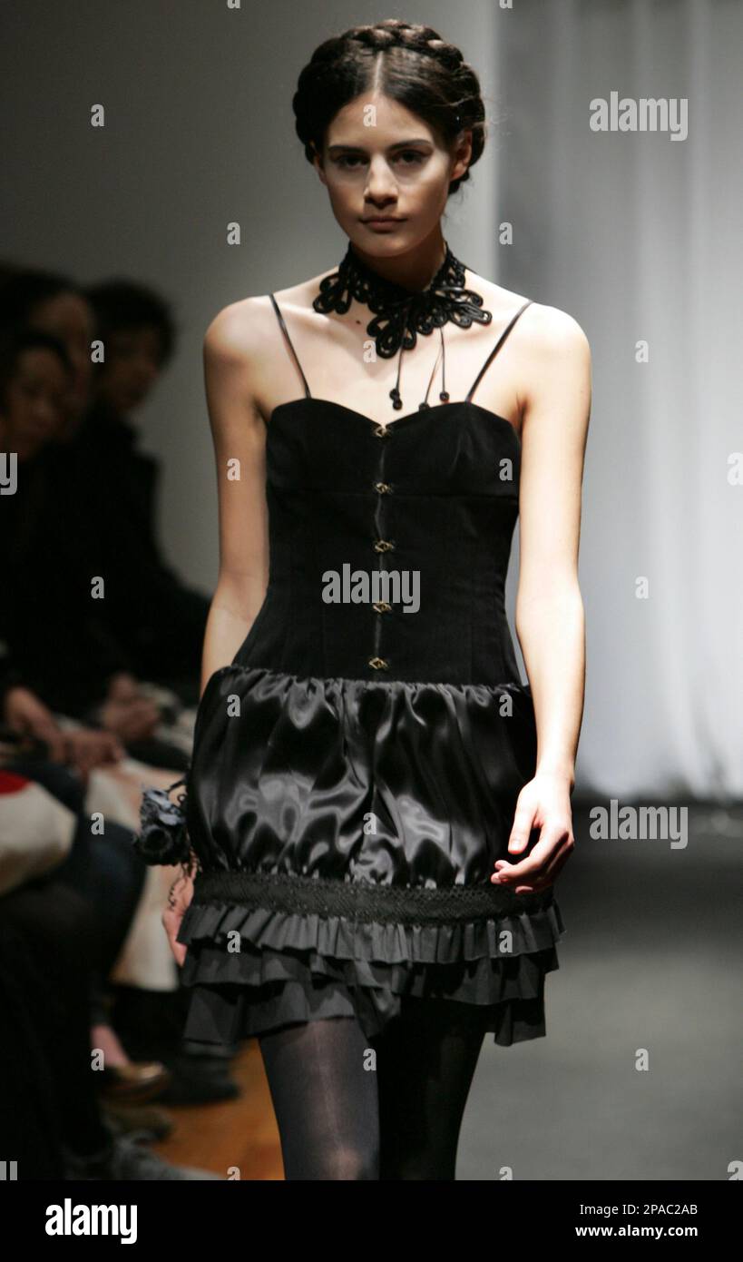A model displays Japanese designer Junya Tashiro's black mini dress during 2008-09 Autumn/Winter Collection at the Japan Fashion Week in Tokyo Thursday, March 13, 2008. (AP Photo/Koji Sasahara Stock Photo - Alamy A model displays Japanese designer Junya Tashiro's black mini dress during 2008-09 Autumn/Winter Collection at the Japan Fashion Week in Tokyo Thursday, March 13, 2008. (AP Photo/Koji Sasahara Stock Photo - Alamy