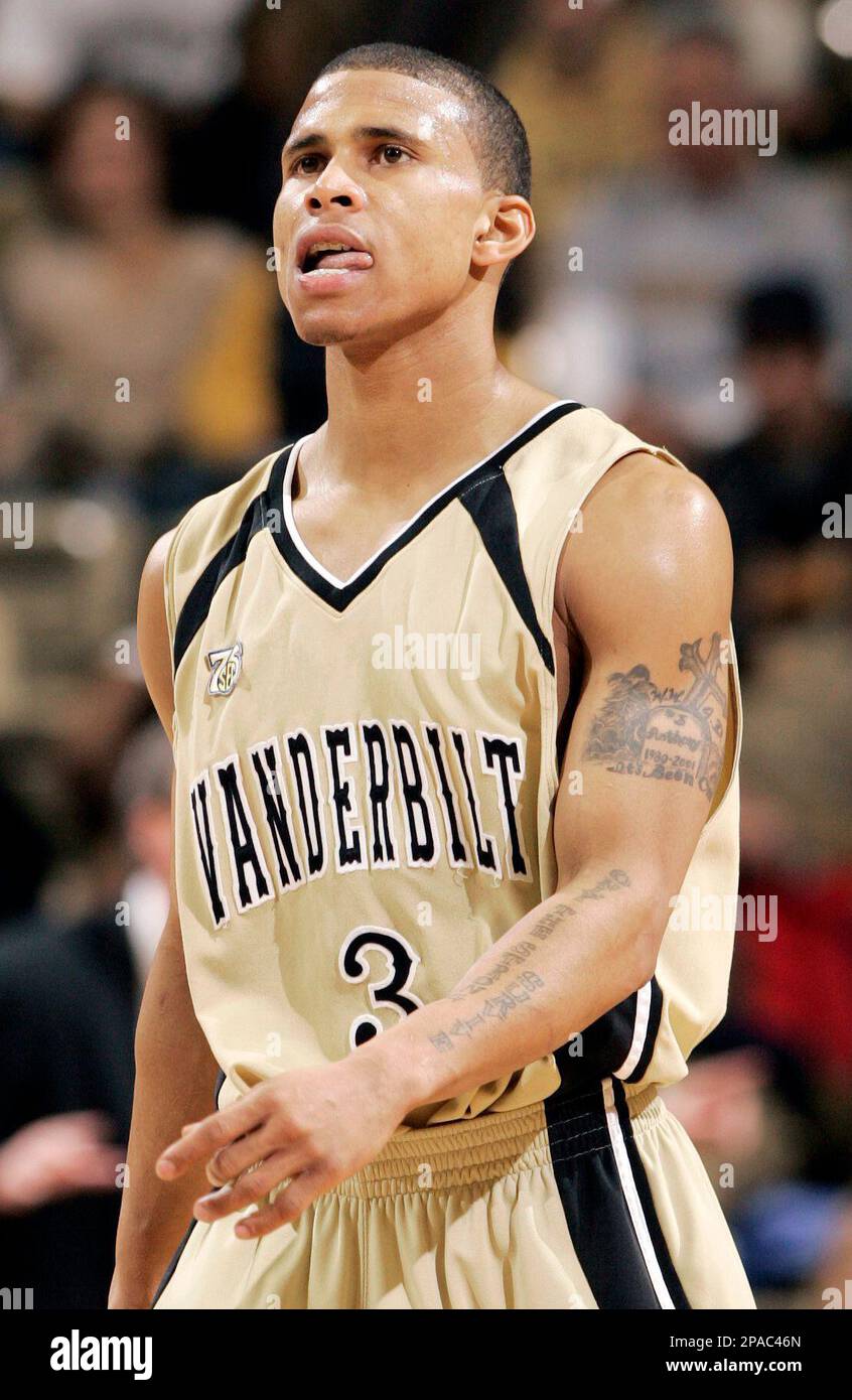 Vanderbilt senior guard Alex Gordon plays against Mississippi State in a  college basketball game in Nashville, Tenn., March 5, 2008. The tattoos on  his left arm are there as a tribute to, image size:846x1390
