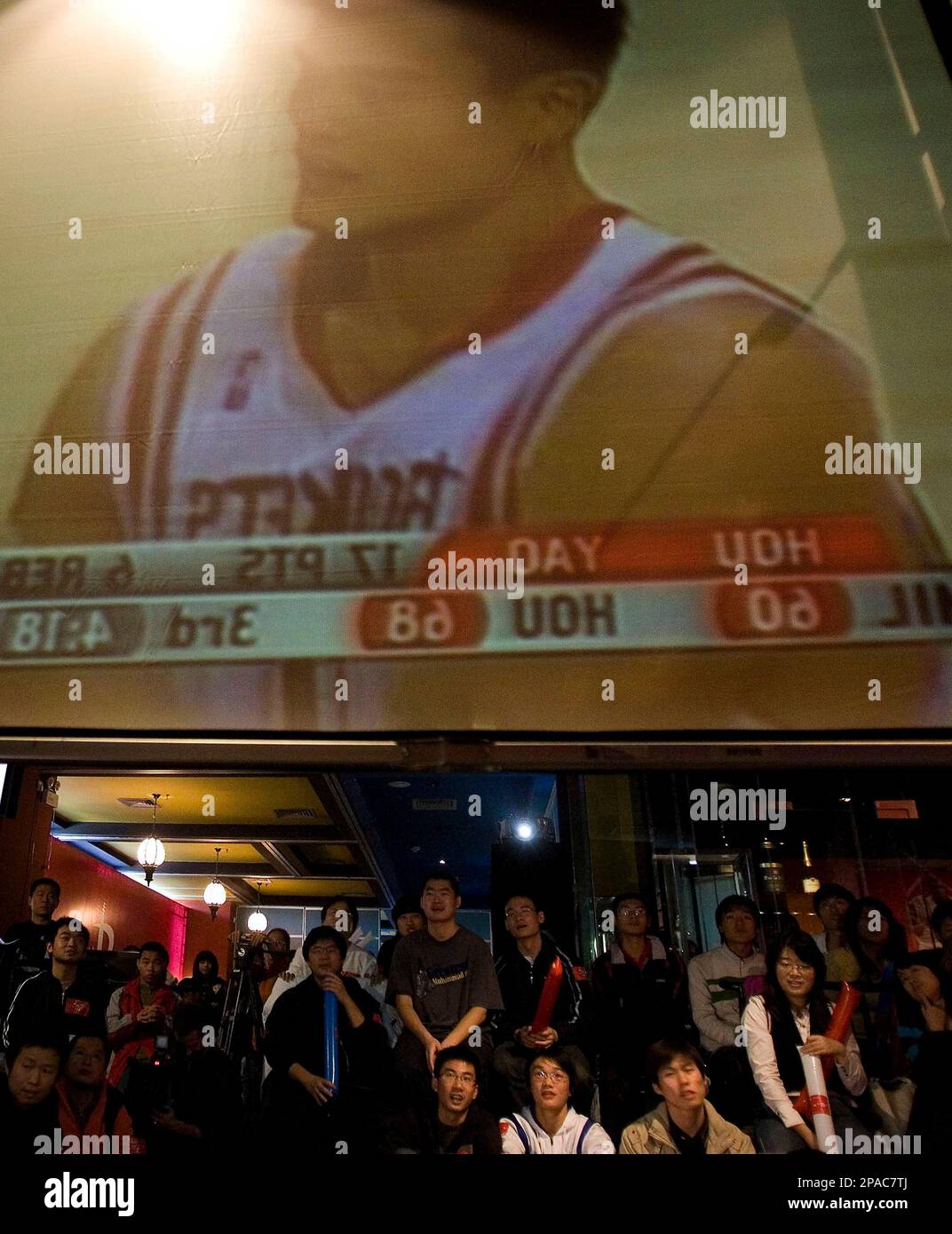 ** FILE ** Houston Rockets's Yao Ming of China appears in the projector ...