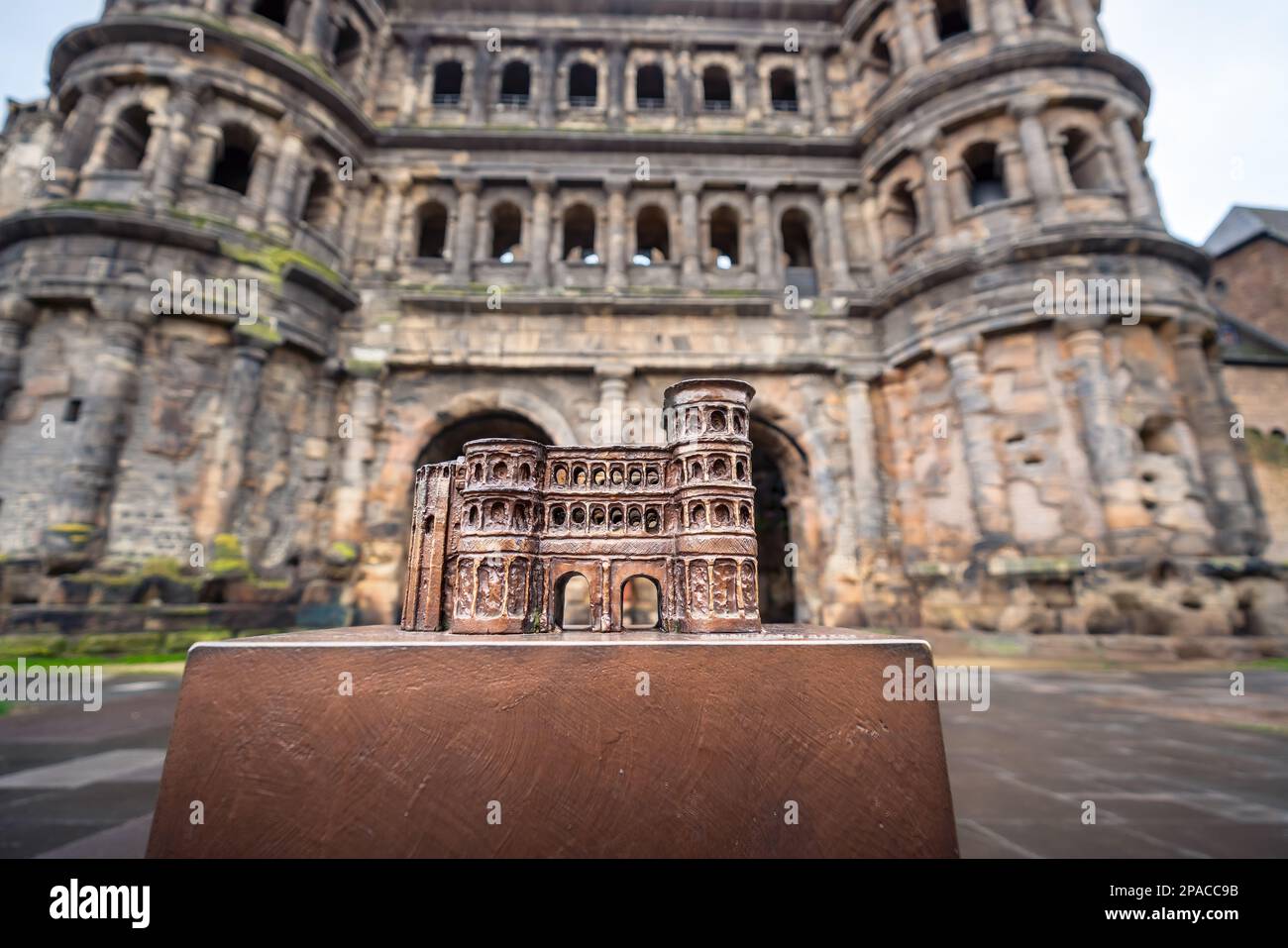 Miniature model of Porta Nigra in front of the real one - Trier, Germany Stock Photo
