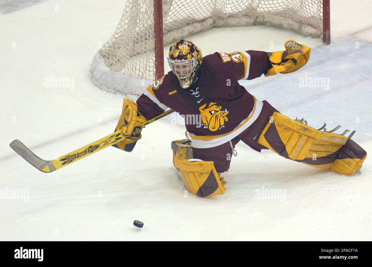 Minnesota Duluth goalie Alex Stalock makes a save in the third period