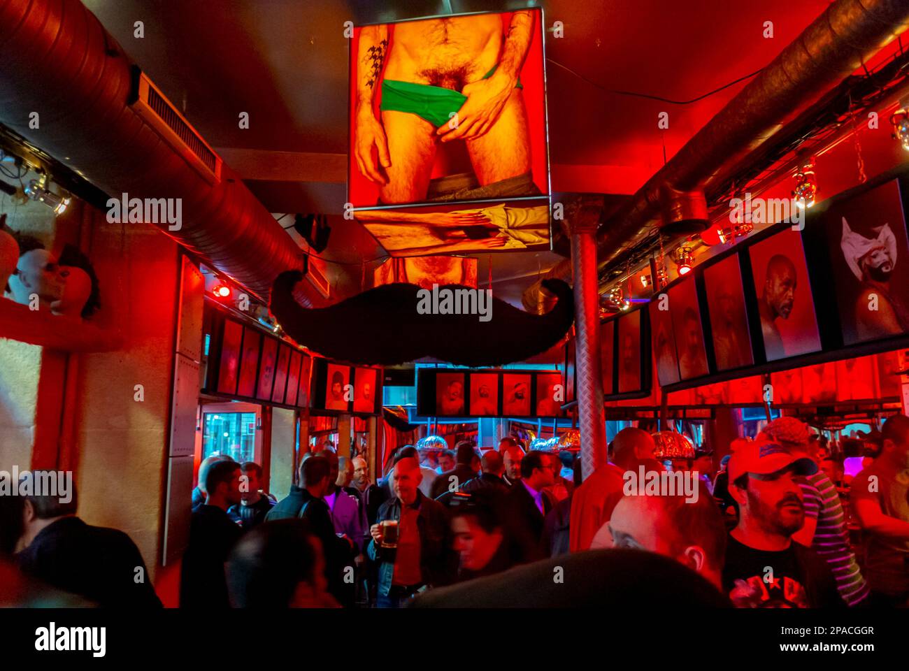 Paris, France, Crowd Gay Men Sharing Drinks inside Gay Bar in the