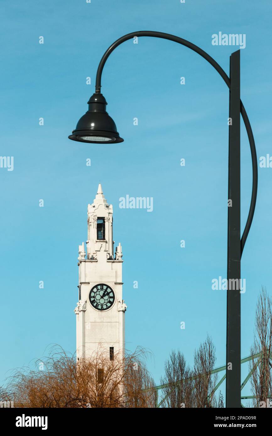 Clock Tower in Old Montreal, street light on blue sky Stock Photo Alamy
