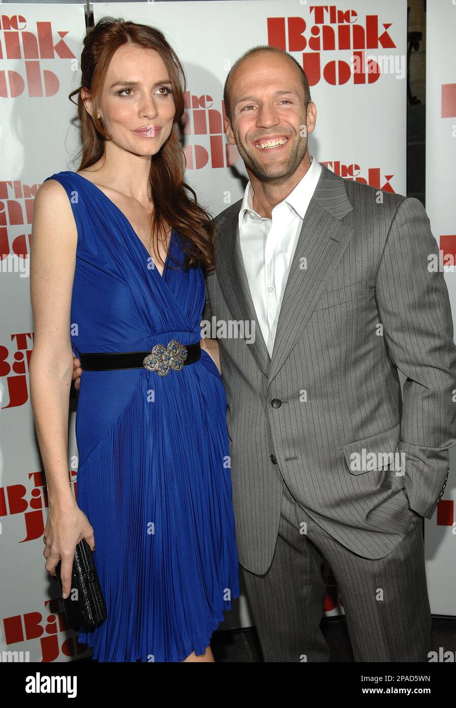 Actors Saffron Burrows and Jason Statham attend a Cinema Society screening of "The Bank Job" at