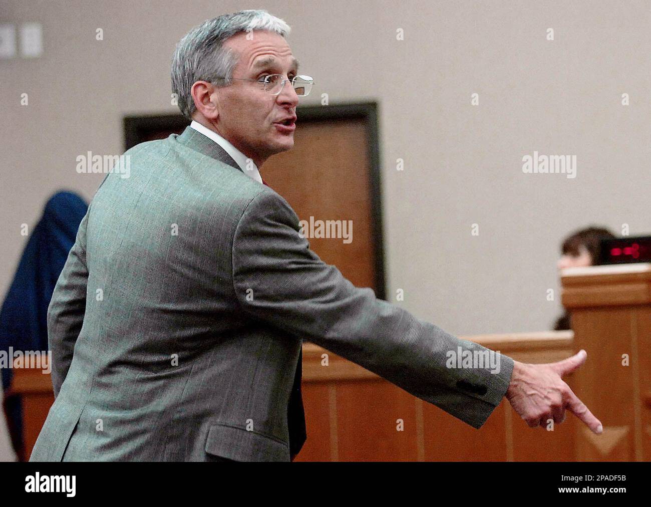 Prosecutor Clifford Reidel points his hand like a gun during closing ...