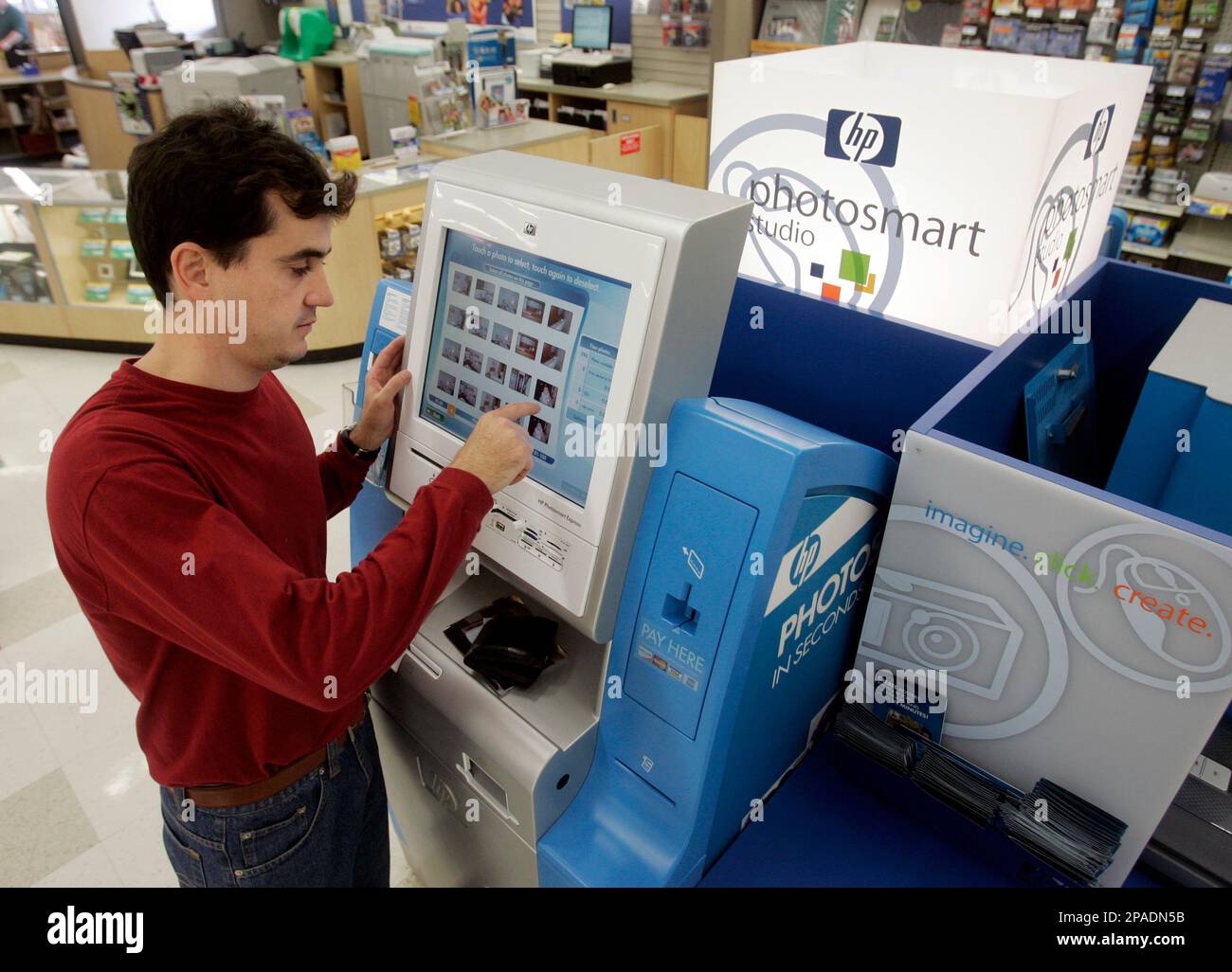 Bryan Rott Long's Drug Store customer Bryan Rott uses an Hewlett Packard photo ...