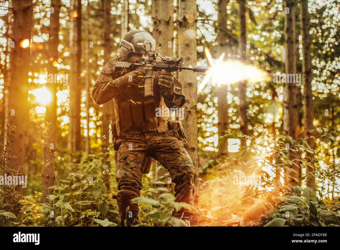 A modern warfare soldier on war duty in dense and dangerous forest ...