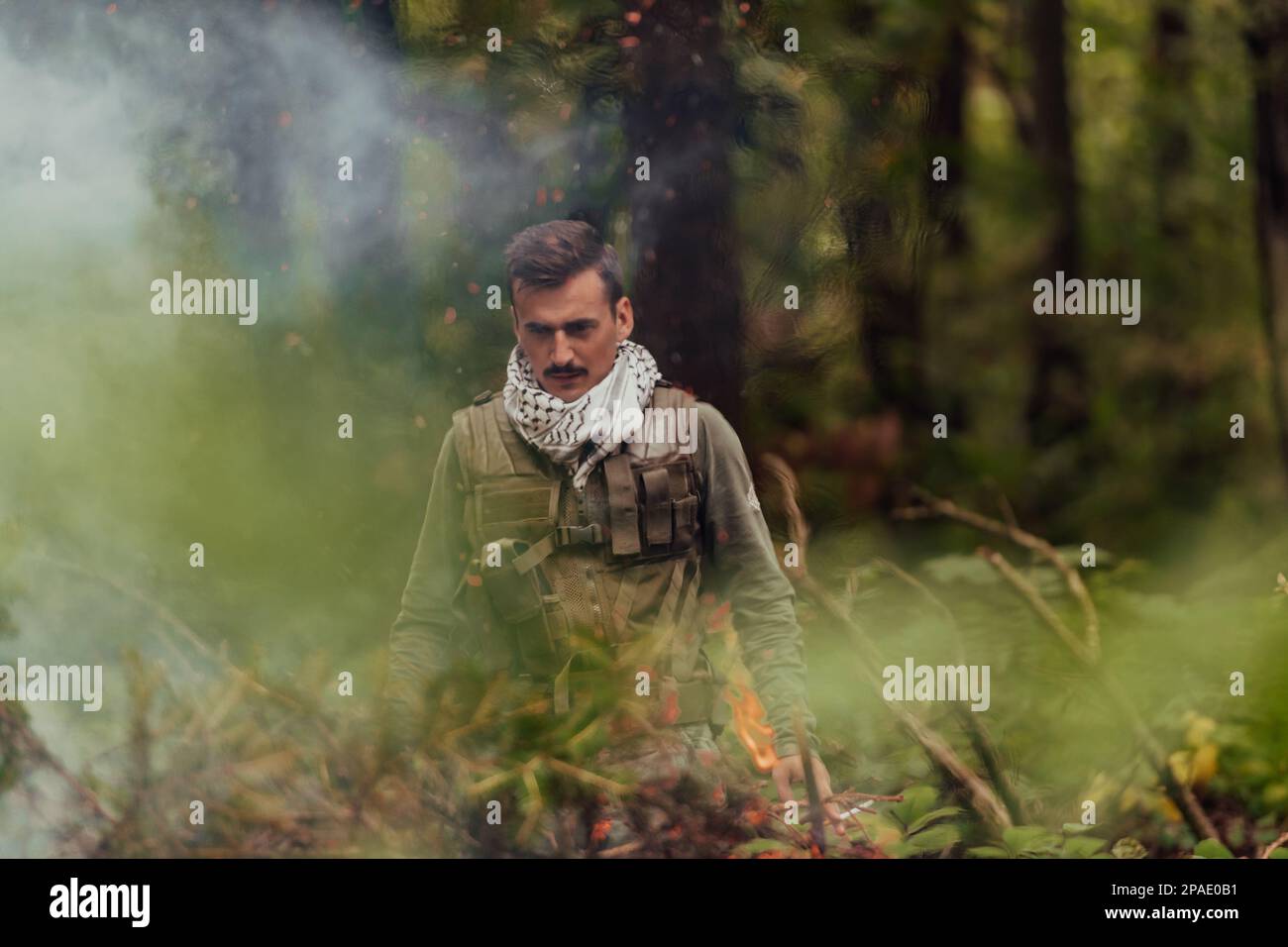 A modern warfare soldier on war duty in dense and dangerous forest ...
