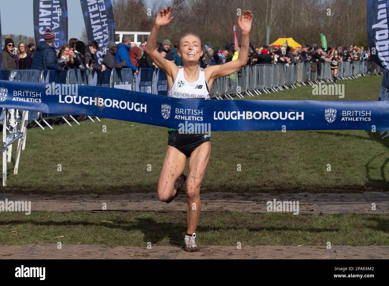 Loughborough, UK. Saturday, 11th March 2023. Sunny. Grace Carson, no. 1119, representing Northern Ireland inter county team, wins senior women, UK Counties Athletic Union 2023 UK inter counties cross country championships and British athletics Cross Challenge, the 5th stage, final race at Prestwold Hall, Loughborough. © Yoko Shelley Credit: Yoko Shelley/Alamy Live News Stock Photo