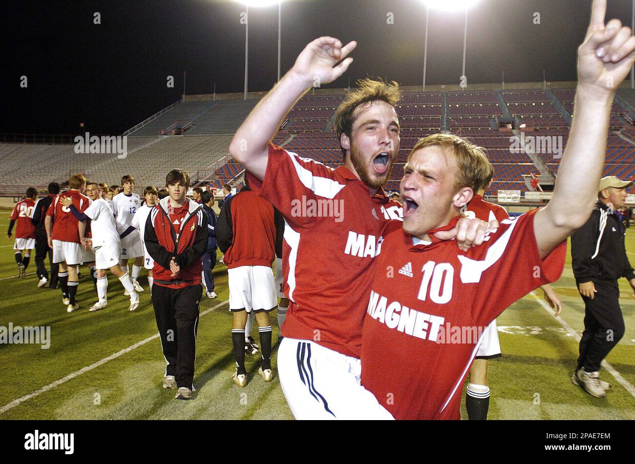Caddo Nick Flowers and Steven Bush, right, celebrate their 21