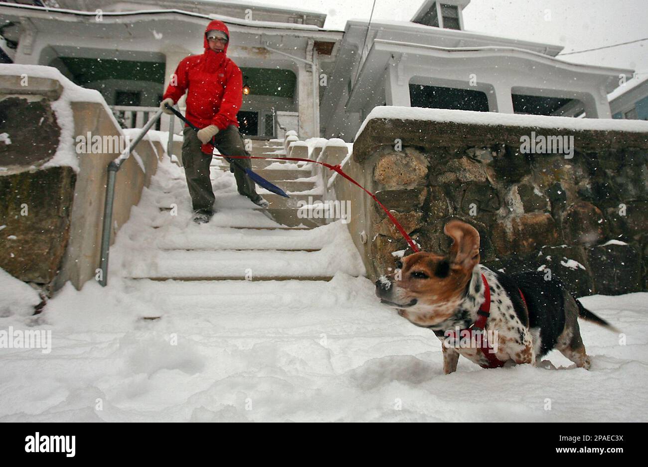 Michael Pruskowski shovels his walk on Western Avenue as his