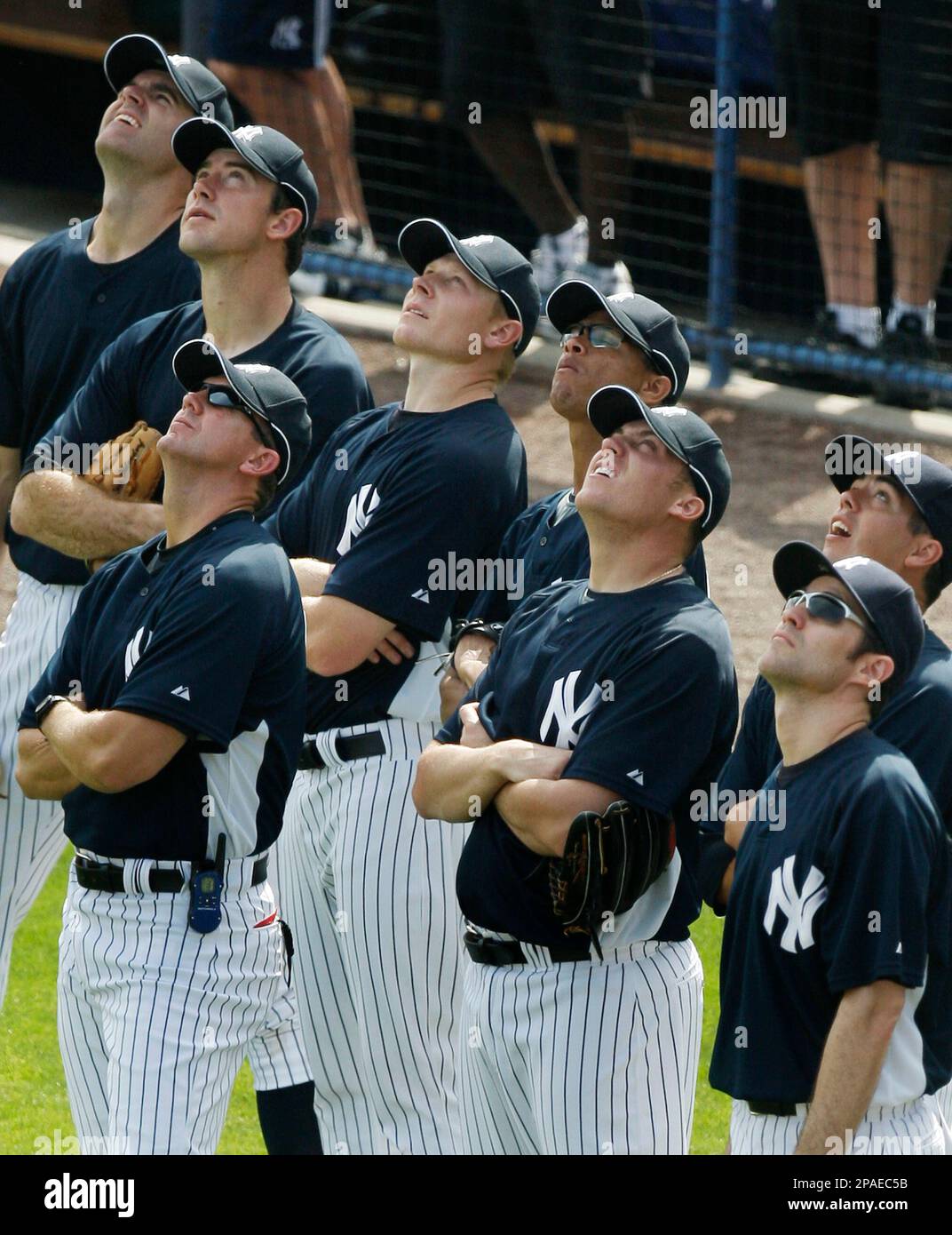 New York Yankees pitchers watch a pop fly during spring training ...