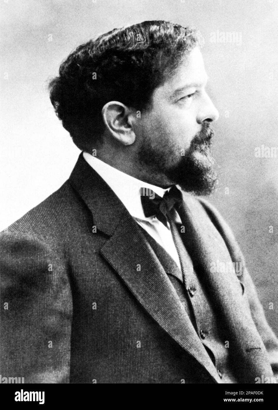 The celebrated french music composer and pianist Claude DEBUSSY ( Saint-Germain-en-Laye 1862 - Paris 1918 )  - COMPOSITORE - MUSICA CLASSICA - classical - musicista - COMPOSITORE - MUSICISTA - MUSICA CLASSICA  - CLASSICAL - PORTRAIT - RITRATTO- barba - beard - papillon - tie bow - profilo  ----       ARCHIVIO GBB Stock Photo
