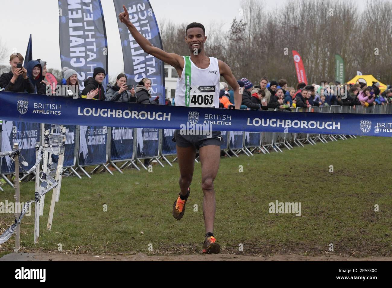Loughborough, UK. Saturday, 11th March 2023. Cloudy. Mahamed Mahamed, no. 4063, representing Hampshire inter county team, wins senior men, UK Counties Athletic Union 2023 UK inter counties cross country championships and British athletics Cross Challenge, the 5th stage, final race at Prestwold Hall, Loughborough. © Yoko Shelley Credit: Yoko Shelley/Alamy Live News Stock Photo