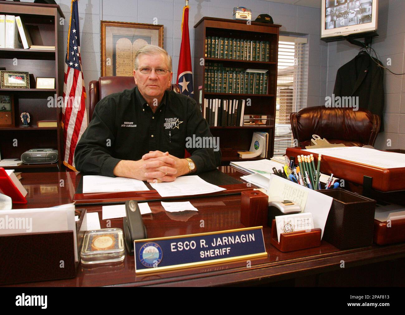 Hamblen County Sheriff Esco Jarnagin poses in his office Monday, Feb. 4,  2008 in Morristown, Tenn. Jarnagin says he's seeing a comeback in  bootlegging, which has a long history in Tennessee, a