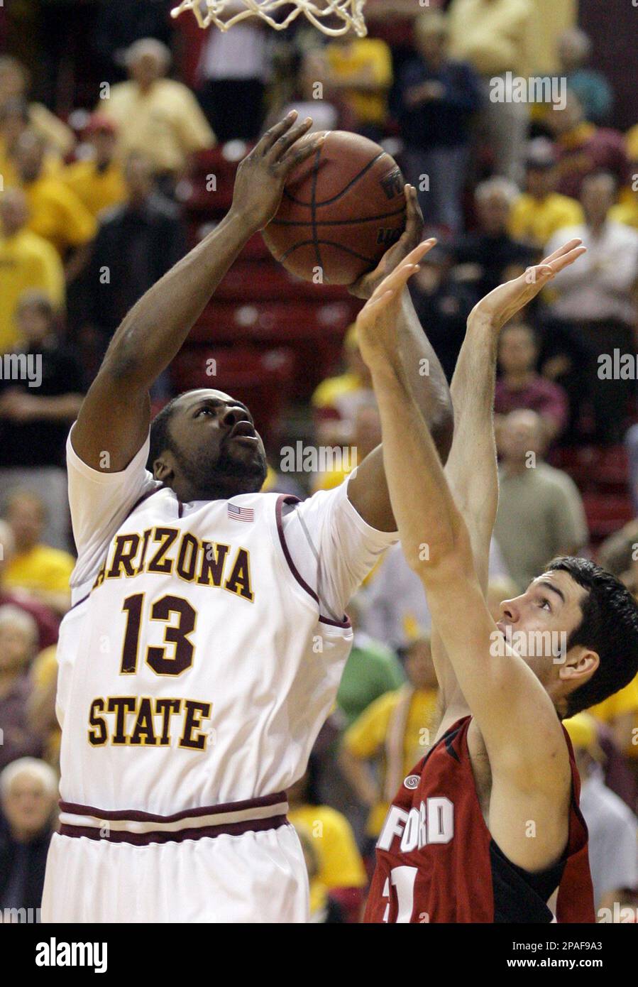 Arizona State guard James Harden left shoots over Stanford