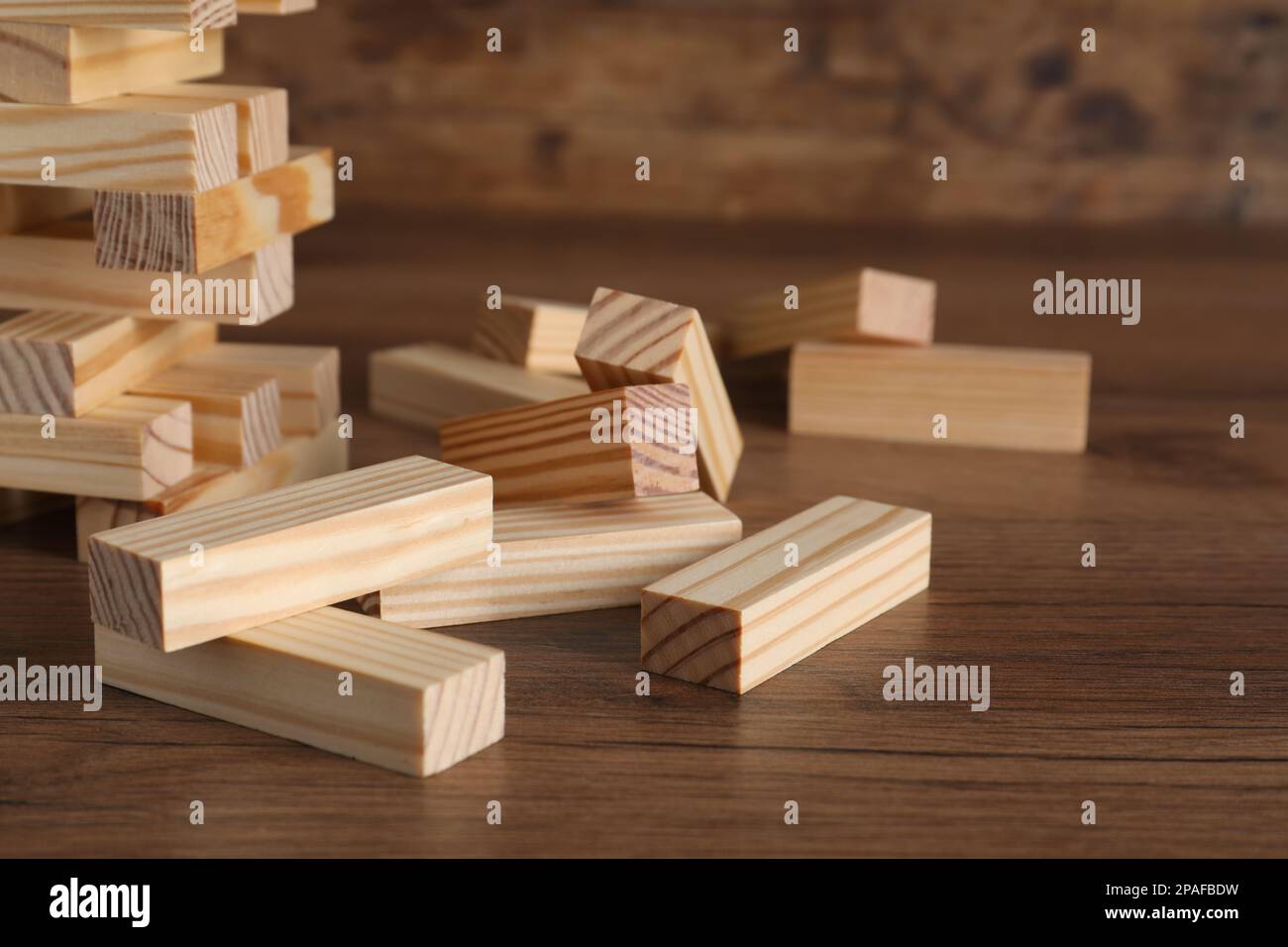 Wooden Jenga blocks on table, closeup. Board game Stock Photo Alamy
